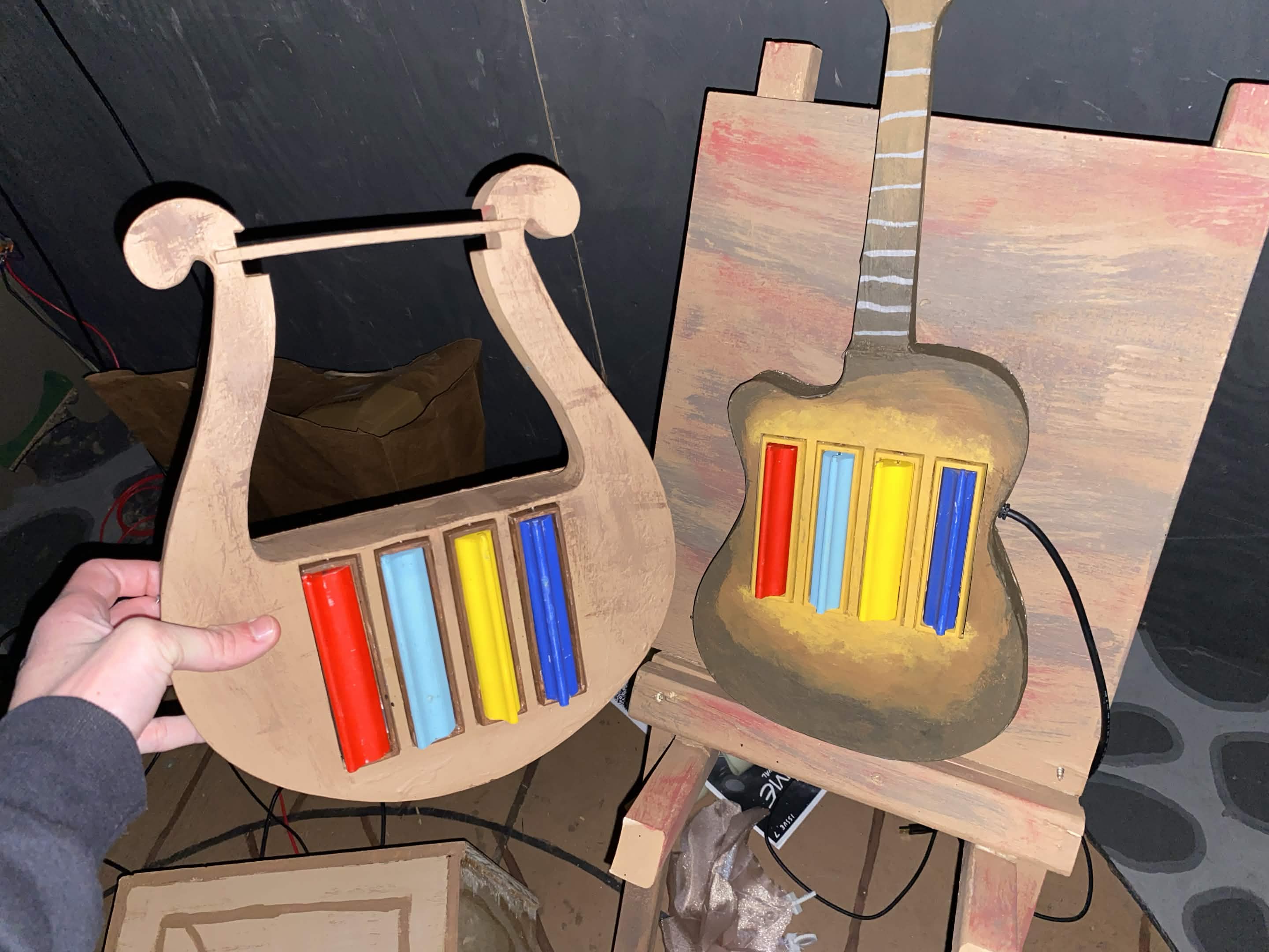 Custom lyres designed for the Hadestown Booth