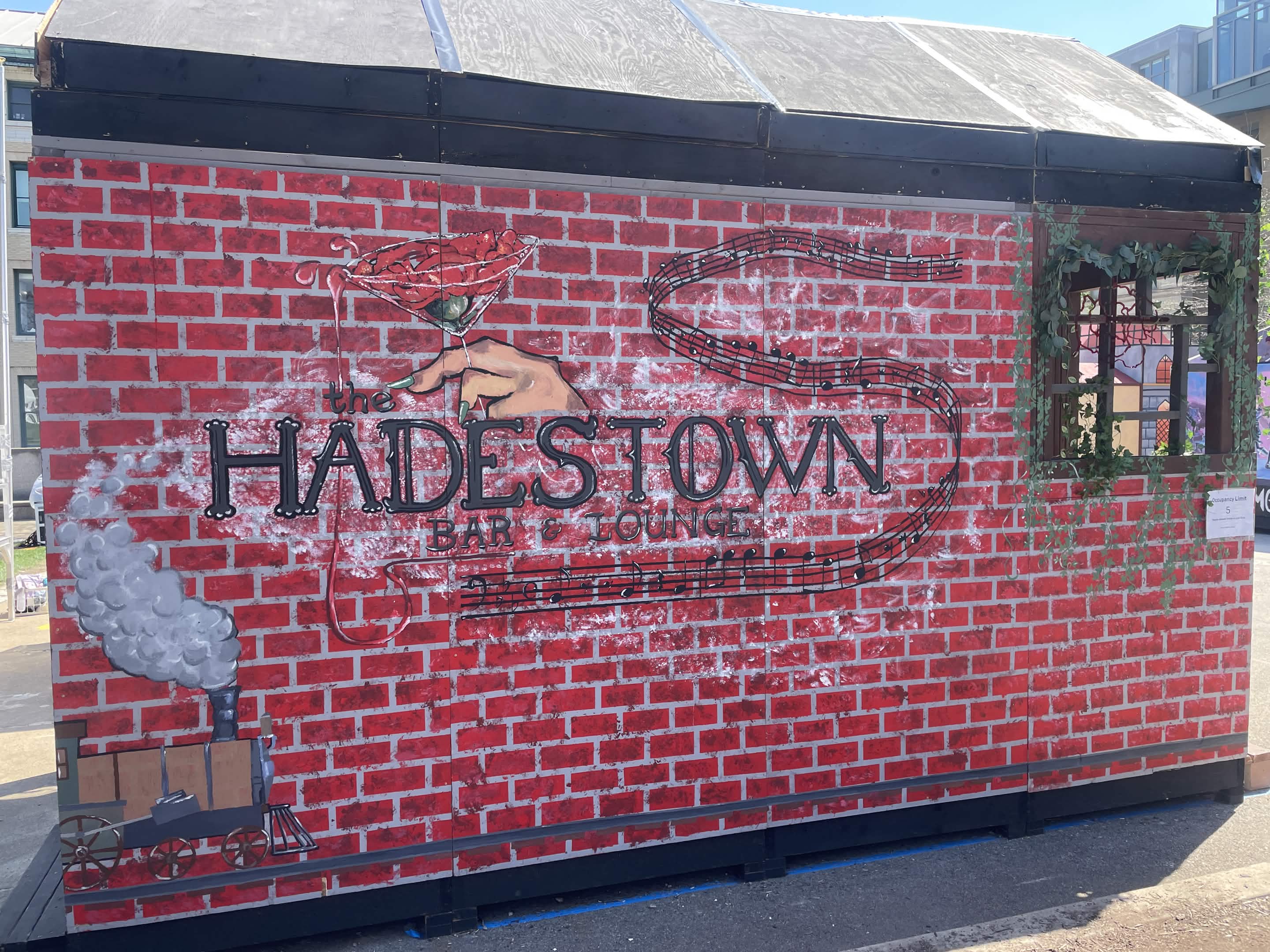 Side of the Hadestown Booth